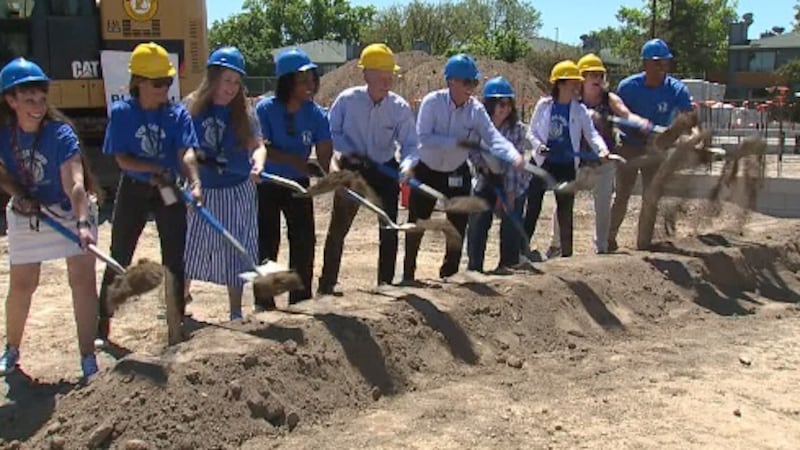 Washoe County School District officials and community members participate in the...