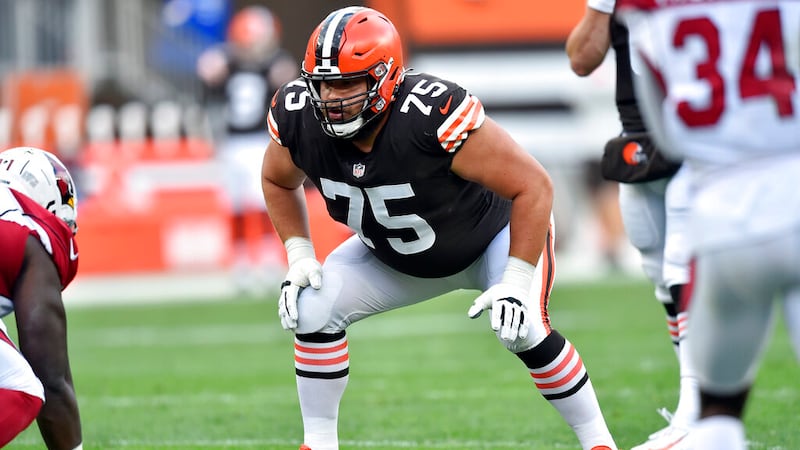 FILE - Cleveland Browns offensive guard Joel Bitonio (75) gets set at the line of scrimmage...