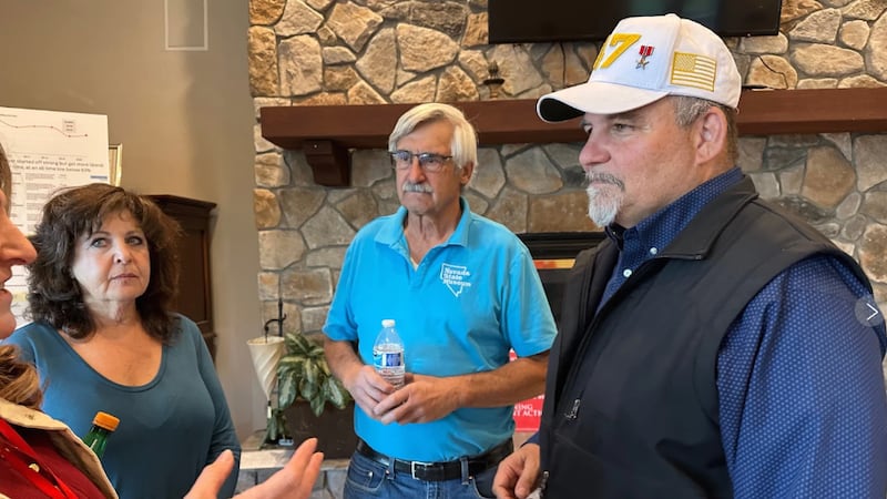 David Flippo, right, a Republican candidate for Congress in Nevada's 2nd district, speaks to...