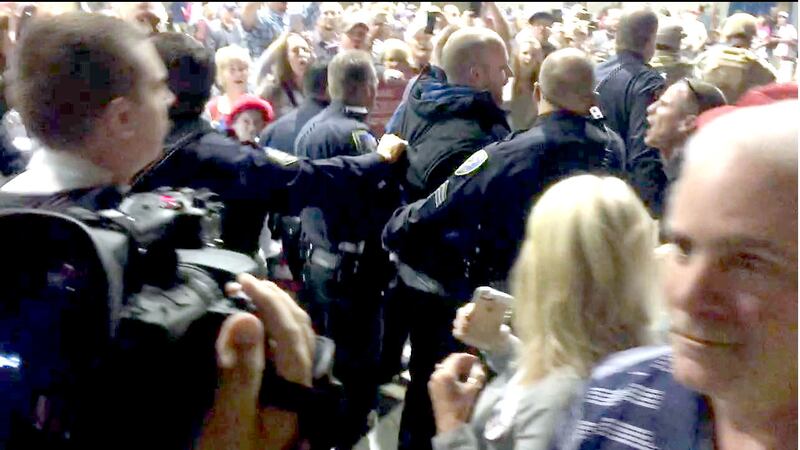 Trunp Reno Rally Trump rushed off Reno stage at campaign rally, returns to finish speech