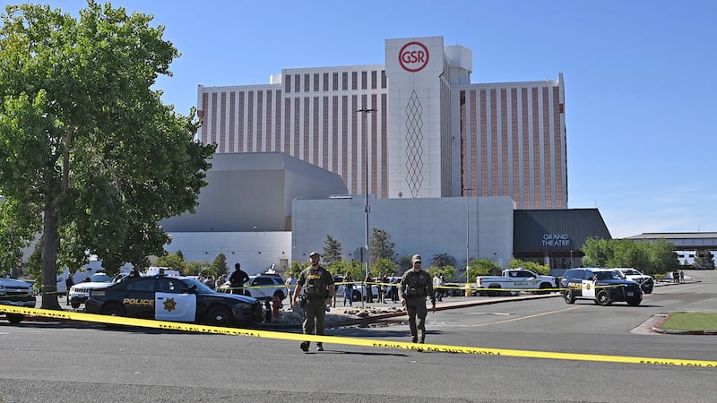 Police respond to a shooting outside the Grand Sierra Resort in Reno, Nev., Monday, July 28,...